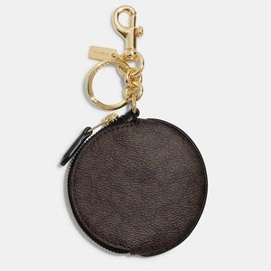 Coach Circular Coin Pouch Bag Charm In Signature Canvas